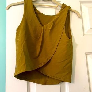 Reversible lulu top (size 6) in light olive green color with build in bra